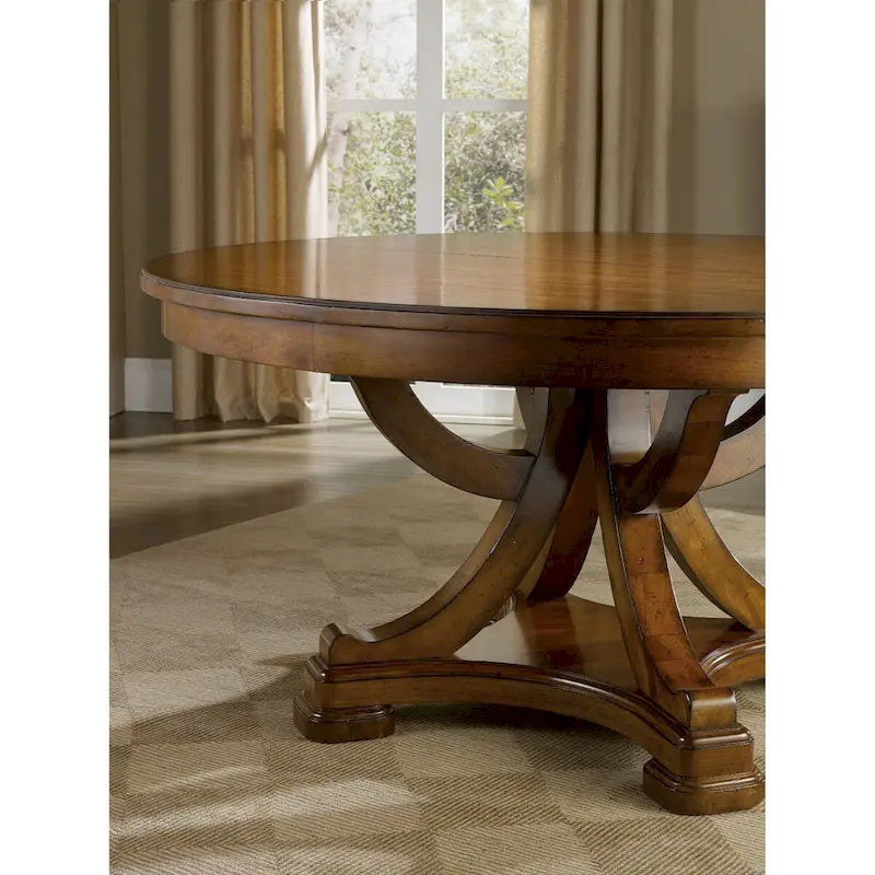 Table à manger ronde à rallonge avec pied central, en aulne finition châtaignier chaud, style traditionnel